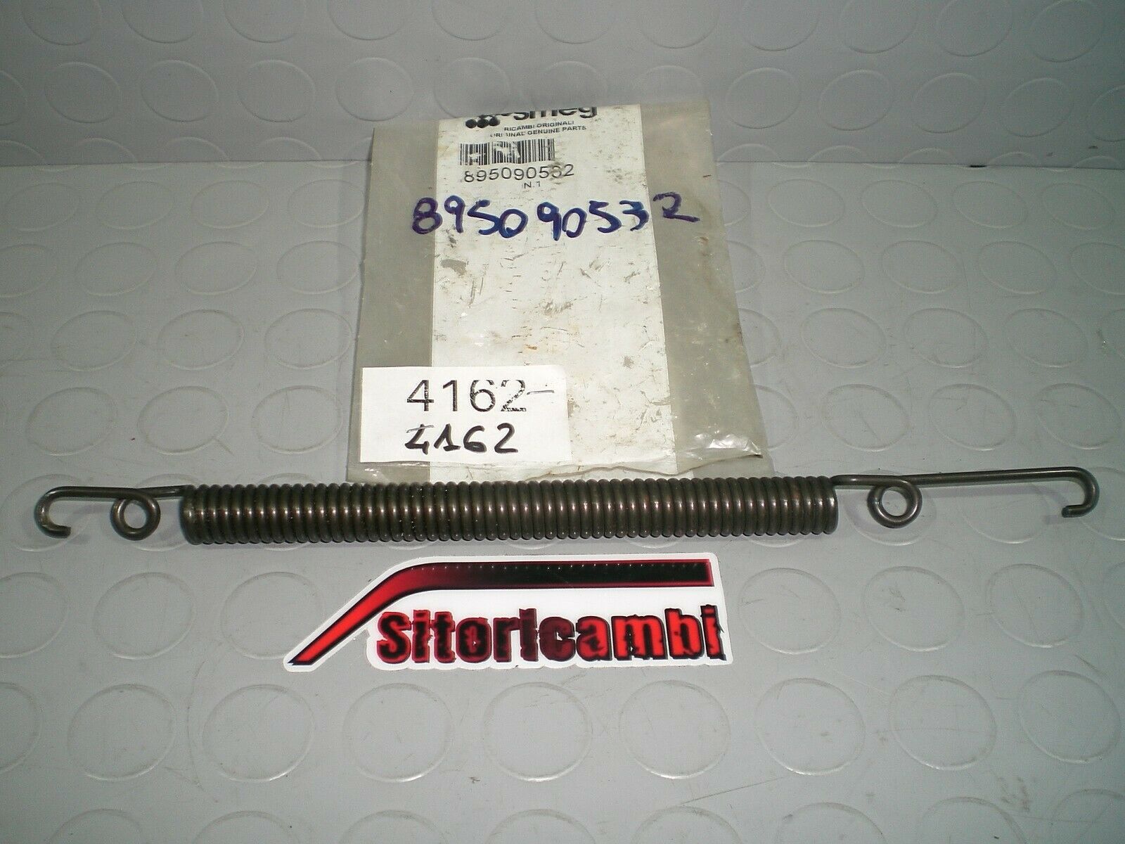 Smeg ressort de porte 895090532 pour lave-vaisselle smeg lsa6147b