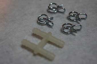 Delonghi raccord + colliers (x4) ms-622135 pour cafetière et expresso / machine à café delonghi dolce gusto mini me kp123b10/ru1 8010000824